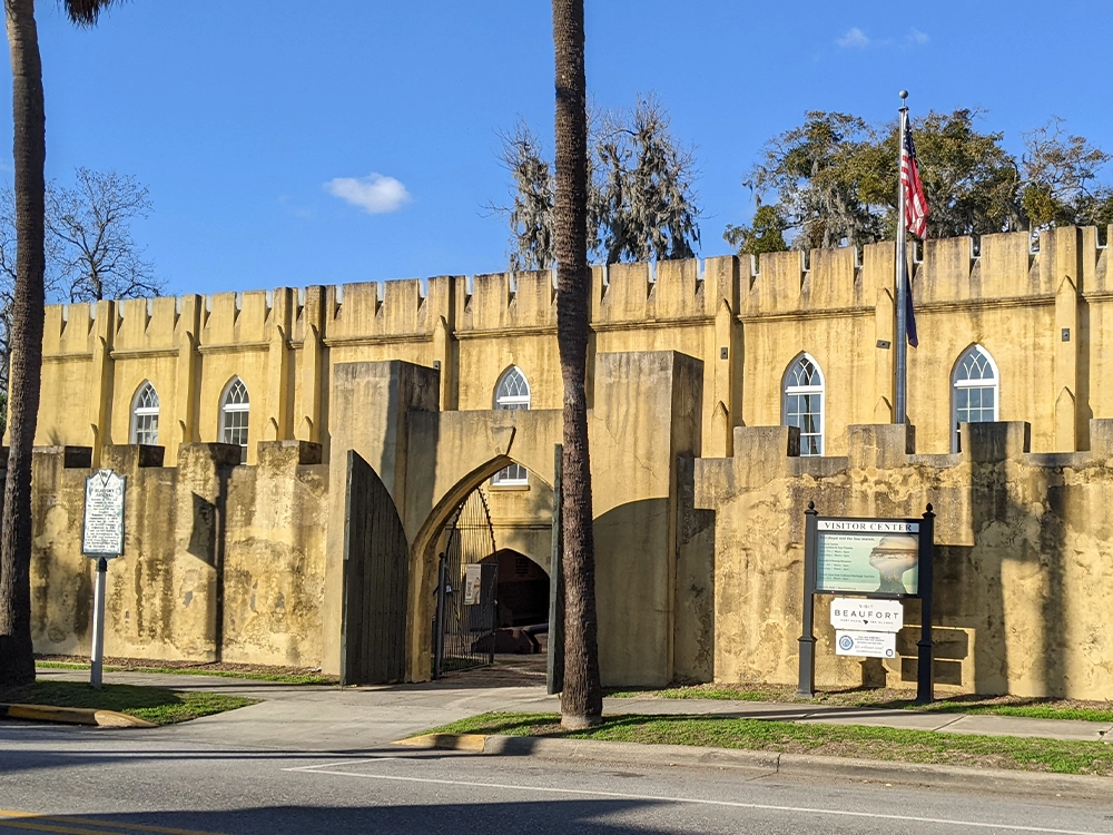 Front entrance of the Beaufort Arsenal with historical marker sign and Visit Beaufort sign in Beaufort South Carolina