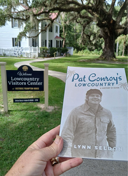 Lynn Seldon holding Pat Conroy's Lowcountry at the Frampton Plantation Visitor Center in Yemassee, South Carolina